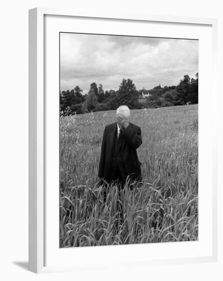 Poet Robert Frost Standing in Oxford Field with His Hand over His Face-Howard Sochurek-Framed Premium Photographic Print