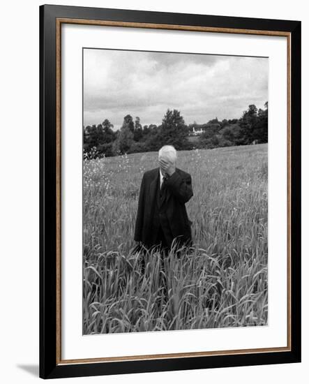 Poet Robert Frost Standing in Oxford Field with His Hand over His Face-Howard Sochurek-Framed Premium Photographic Print