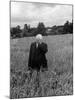 Poet Robert Frost Standing in Oxford Field with His Hand over His Face-Howard Sochurek-Mounted Premium Photographic Print