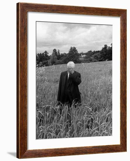 Poet Robert Frost Standing in Oxford Field with His Hand over His Face-Howard Sochurek-Framed Premium Photographic Print