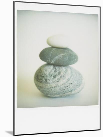 Polaroid of Three Sea-Worn Pebbles Piled Up Against a White Background-Lee Frost-Mounted Photographic Print