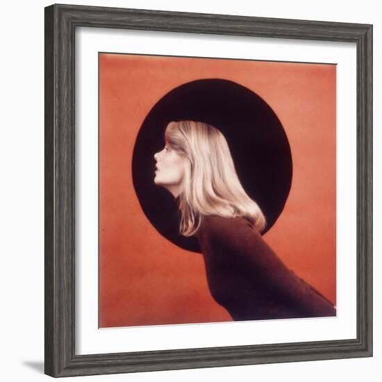 Polaroid, Profile of Woman in Brown Sweather Against Red Bkgd with Black Circle-Co Rentmeester-Framed Photographic Print