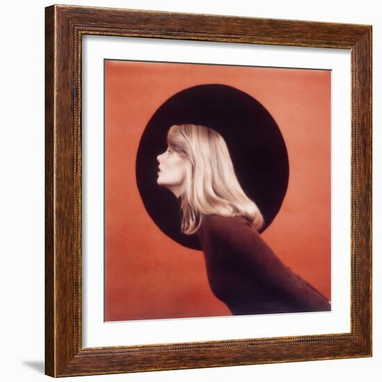 Polaroid, Profile of Woman in Brown Sweather Against Red Bkgd with Black Circle-Co Rentmeester-Framed Photographic Print