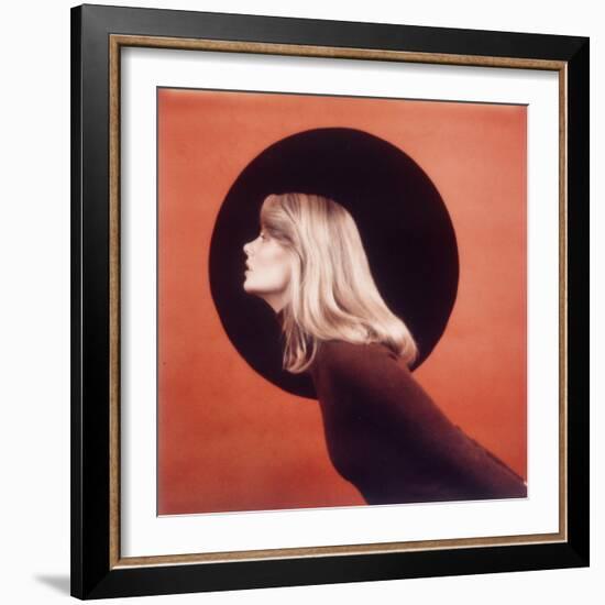 Polaroid, Profile of Woman in Brown Sweather Against Red Bkgd with Black Circle-Co Rentmeester-Framed Photographic Print