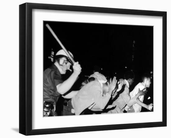 Police Club Demonstrators in Harlem on July 20, 1964-null-Framed Photo