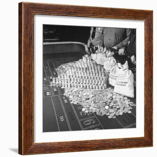 Police Guarding $500,000 in Silver Being Used During a WWII War Bond Rally in a Gambling Casino-John Florea-Framed Photographic Print