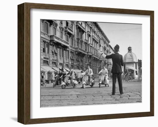 Police Officer Directing Traffic-Dmitri Kessel-Framed Photographic Print