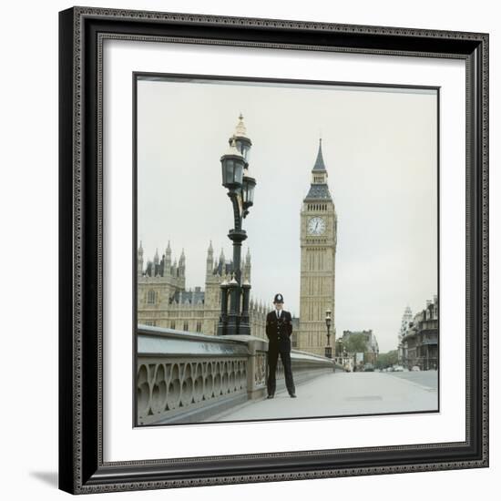 Police Officer on Duty on Westminster Bridge by Big Ben, London. Metropolitan Police-null-Framed Photographic Print