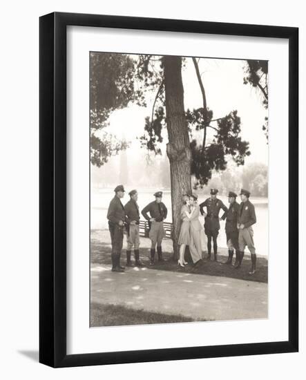 Police Officers Surrounding Romantic Couple in Park-null-Framed Photo