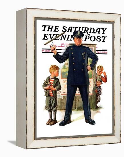 "Policeman and Boy with Slingshot," Saturday Evening Post Cover, March 15, 1930-Frederic Stanley-Framed Premier Image Canvas