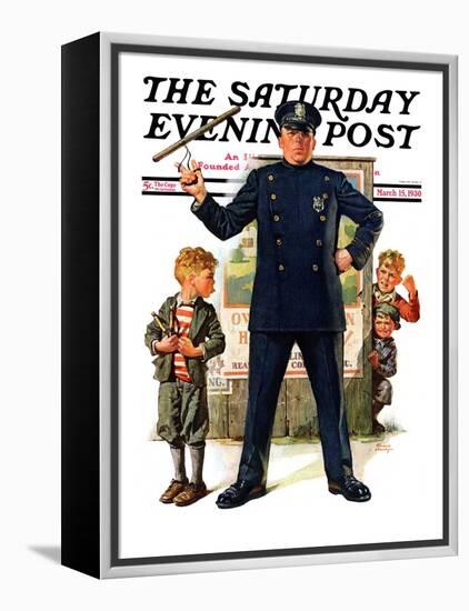 "Policeman and Boy with Slingshot," Saturday Evening Post Cover, March 15, 1930-Frederic Stanley-Framed Premier Image Canvas