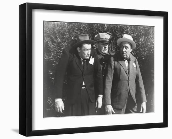 Policeman Arresting Two Men-null-Framed Photo