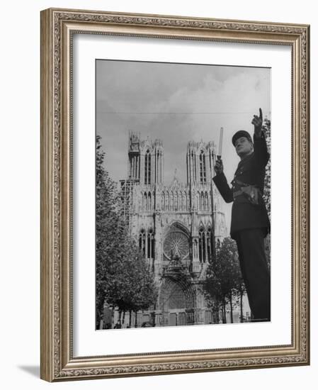 Policeman Directing Traffic in Front of the Reims Cathedral-Nat Farbman-Framed Photographic Print