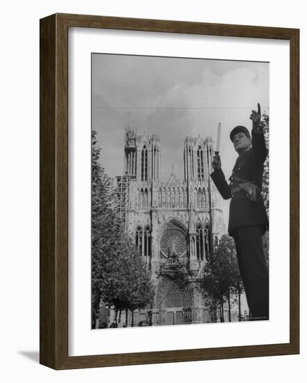 Policeman Directing Traffic in Front of the Reims Cathedral-Nat Farbman-Framed Photographic Print