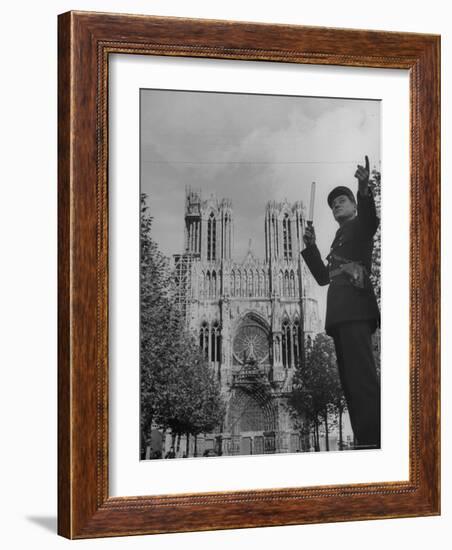 Policeman Directing Traffic in Front of the Reims Cathedral-Nat Farbman-Framed Photographic Print