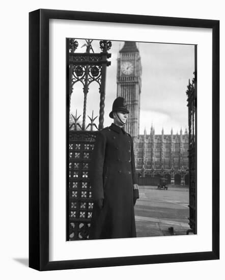 Policeman on Duty Outside the Houses of Parliament and Big Ben in London-null-Framed Photographic Print