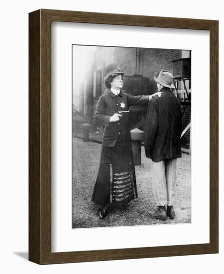 Policewoman Making an Arrest Photograph-Lantern Press-Framed Art Print