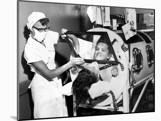 Polio Patient Flossie Rogers Looking at the World Through the Mirror of Her Iron Lung in June 1957-null-Mounted Photo