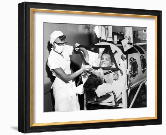 Polio Patient Flossie Rogers Looking at the World Through the Mirror of Her Iron Lung in June 1957-null-Framed Photo