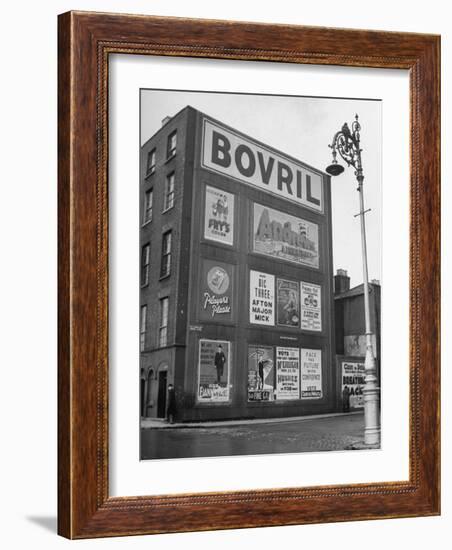 Political Posters Covering the Wall of a Building-Tony Linck-Framed Photographic Print