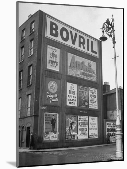 Political Posters Covering the Wall of a Building-Tony Linck-Mounted Photographic Print