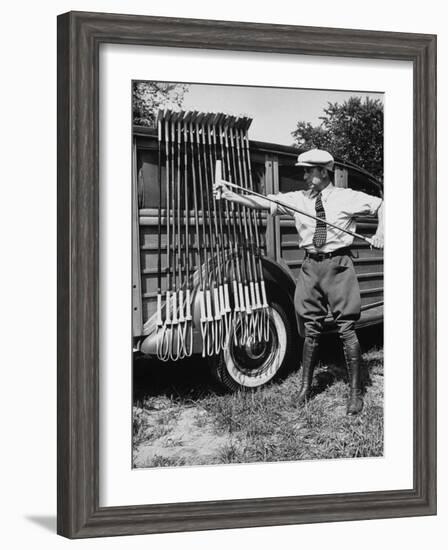 Polo Player Checking the Mallets-Alfred Eisenstaedt-Framed Photographic Print