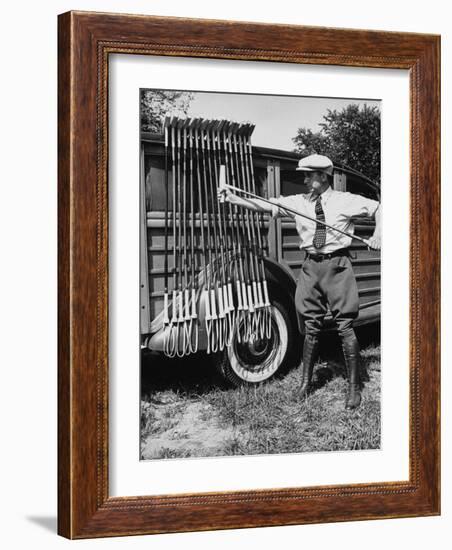 Polo Player Checking the Mallets-Alfred Eisenstaedt-Framed Photographic Print