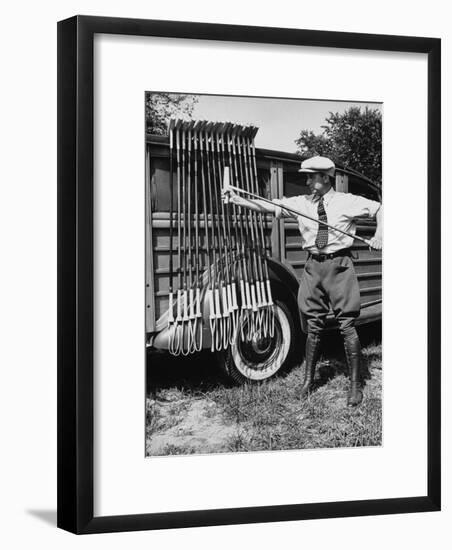 Polo Player Checking the Mallets-Alfred Eisenstaedt-Framed Photographic Print