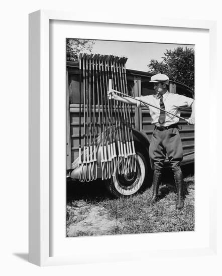 Polo Player Checking the Mallets-Alfred Eisenstaedt-Framed Photographic Print