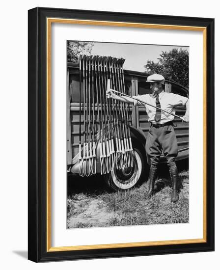 Polo Player Checking the Mallets-Alfred Eisenstaedt-Framed Photographic Print