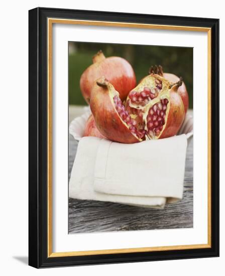 Pomegranates, Whole and Halved, on Cloth in White Bowl-null-Framed Photographic Print