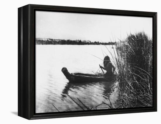 Pomo Indian Poling His Boat Made of Tule Rushes Through Shallows of Clear Lake, Northen California-Edward S^ Curtis-Framed Premier Image Canvas