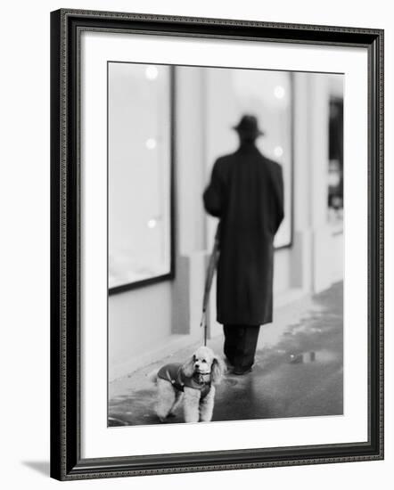 Poodle with Man, Lucerne, Switzerland-Walter Bibikow-Framed Photographic Print