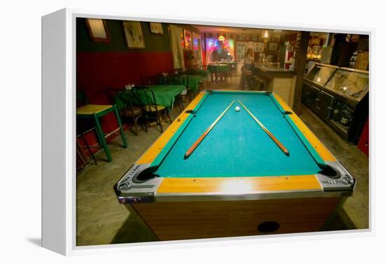 Pool table lit by electric lights in a restaurant and bar in Shoshone, CA near Death Valley Nati...-null-Framed Premier Image Canvas