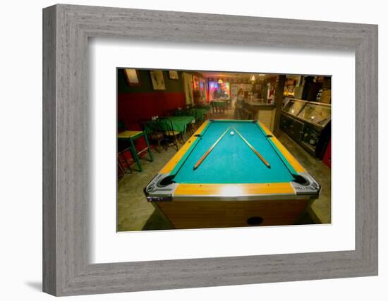 Pool table lit by electric lights in a restaurant and bar in Shoshone, CA near Death Valley Nati...-null-Framed Photographic Print