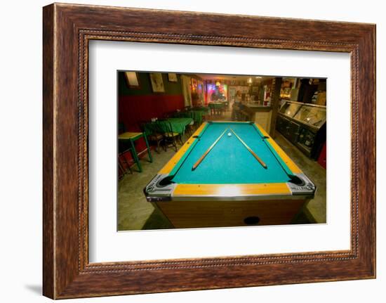 Pool table lit by electric lights in a restaurant and bar in Shoshone, CA near Death Valley Nati...-null-Framed Photographic Print