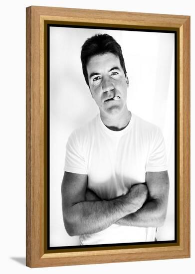 Pop Idol Judge Simon Cowell Poses Smoking a Cigarette at Max Clifford's Office London-null-Framed Premier Image Canvas