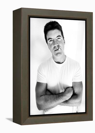 Pop Idol Judge Simon Cowell Poses Smoking a Cigarette at Max Clifford's Office London-null-Framed Premier Image Canvas