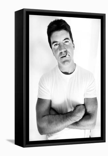 Pop Idol Judge Simon Cowell Poses Smoking a Cigarette at Max Clifford's Office London-null-Framed Premier Image Canvas