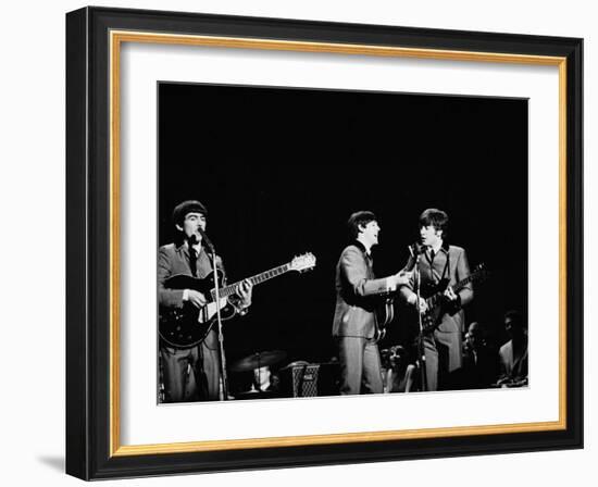 Pop Music Group the Beatles in Concert George Harrison, Paul McCartney, John Lennon-Ralph Morse-Framed Premium Photographic Print