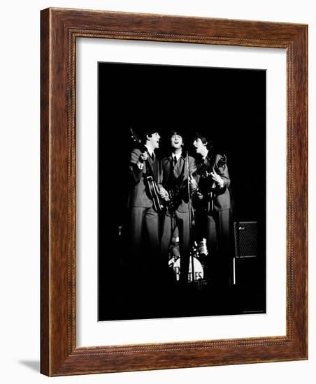 Pop Music Group the Beatles in Concert Paul McCartney, John Lennon, George Harrison-Ralph Morse-Framed Premium Photographic Print