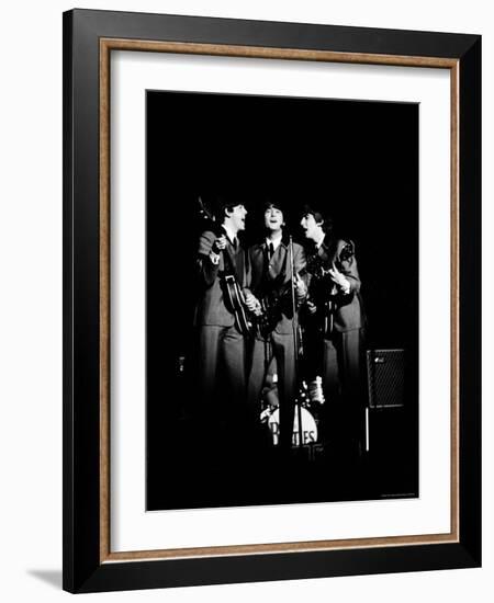 Pop Music Group the Beatles in Concert Paul McCartney, John Lennon, George Harrison-Ralph Morse-Framed Premium Photographic Print