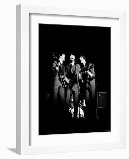 Pop Music Group the Beatles in Concert Paul McCartney, John Lennon, George Harrison-Ralph Morse-Framed Premium Photographic Print