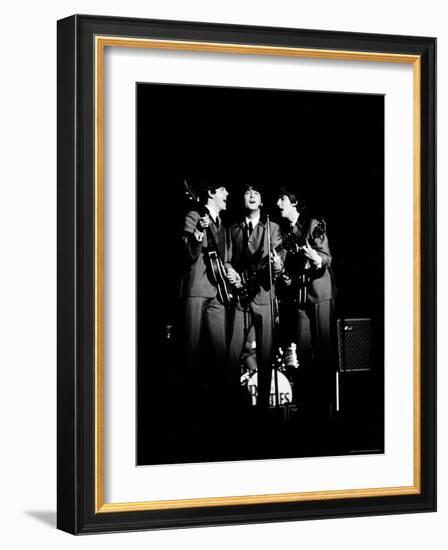 Pop Music Group the Beatles in Concert Paul McCartney, John Lennon, George Harrison-Ralph Morse-Framed Premium Photographic Print