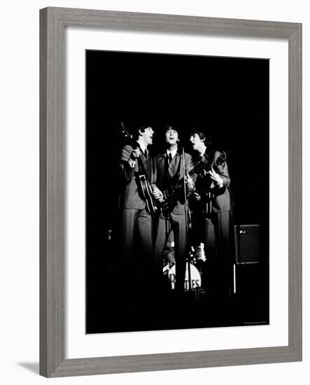 Pop Music Group the Beatles in Concert Paul McCartney, John Lennon, George Harrison-Ralph Morse-Framed Premium Photographic Print