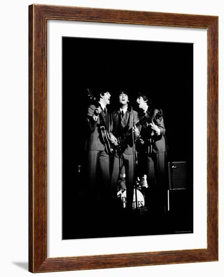 Pop Music Group the Beatles in Concert Paul McCartney, John Lennon, George Harrison-Ralph Morse-Framed Premium Photographic Print