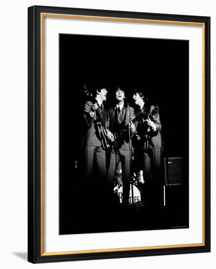 Pop Music Group the Beatles in Concert Paul McCartney, John Lennon, George Harrison-Ralph Morse-Framed Premium Photographic Print