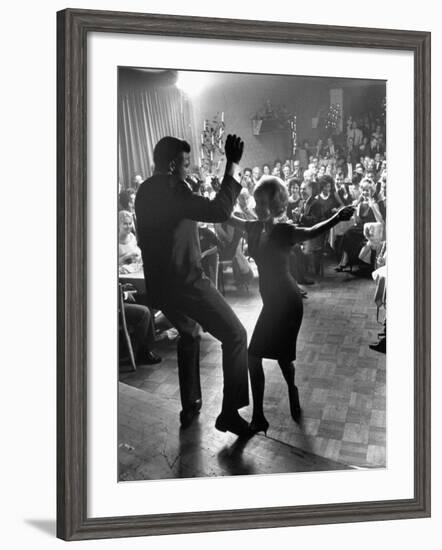 Pop Singer Chubby Checker Singing His Hit Song "The Twist" at the Crescendo Nightclub-Ralph Crane-Framed Premium Photographic Print