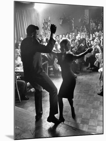 Pop Singer Chubby Checker Singing His Hit Song "The Twist" at the Crescendo Nightclub-Ralph Crane-Mounted Premium Photographic Print