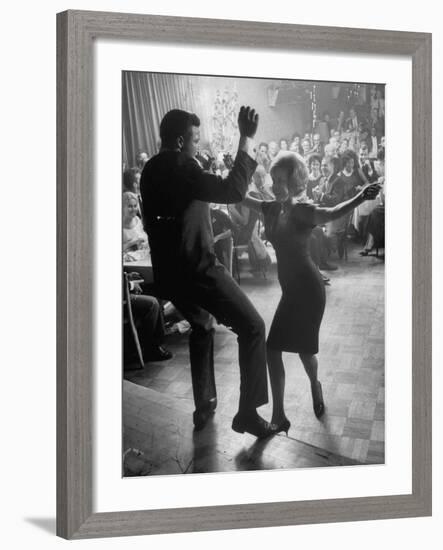 Pop Singer Chubby Checker Singing His Hit Song "The Twist" on Dance Floor at Crescendo Nightclub-Ralph Crane-Framed Premium Photographic Print